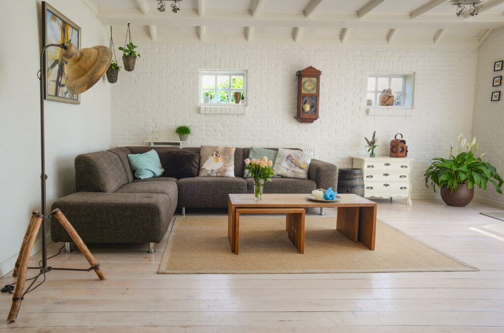 A living room with a couch and coffee table